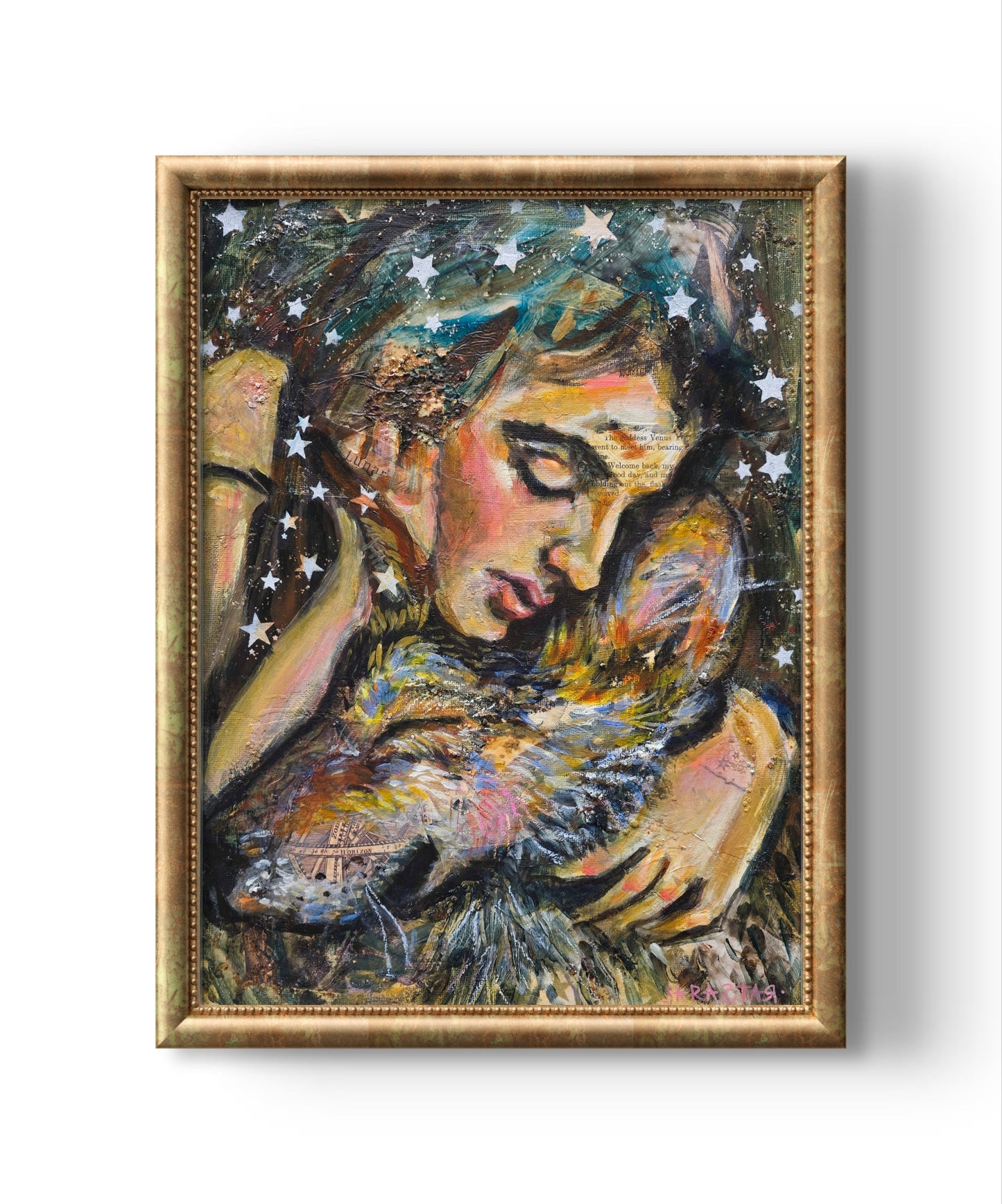 A framed painting depicting a woman embracing a wolf, with stars scattered across the dark background, shown against a plain white wall.